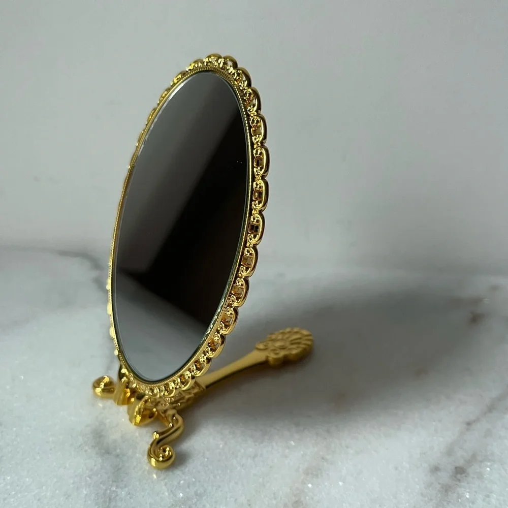 Izzy and Liv gold Fold Away Hand Mirror adjustable